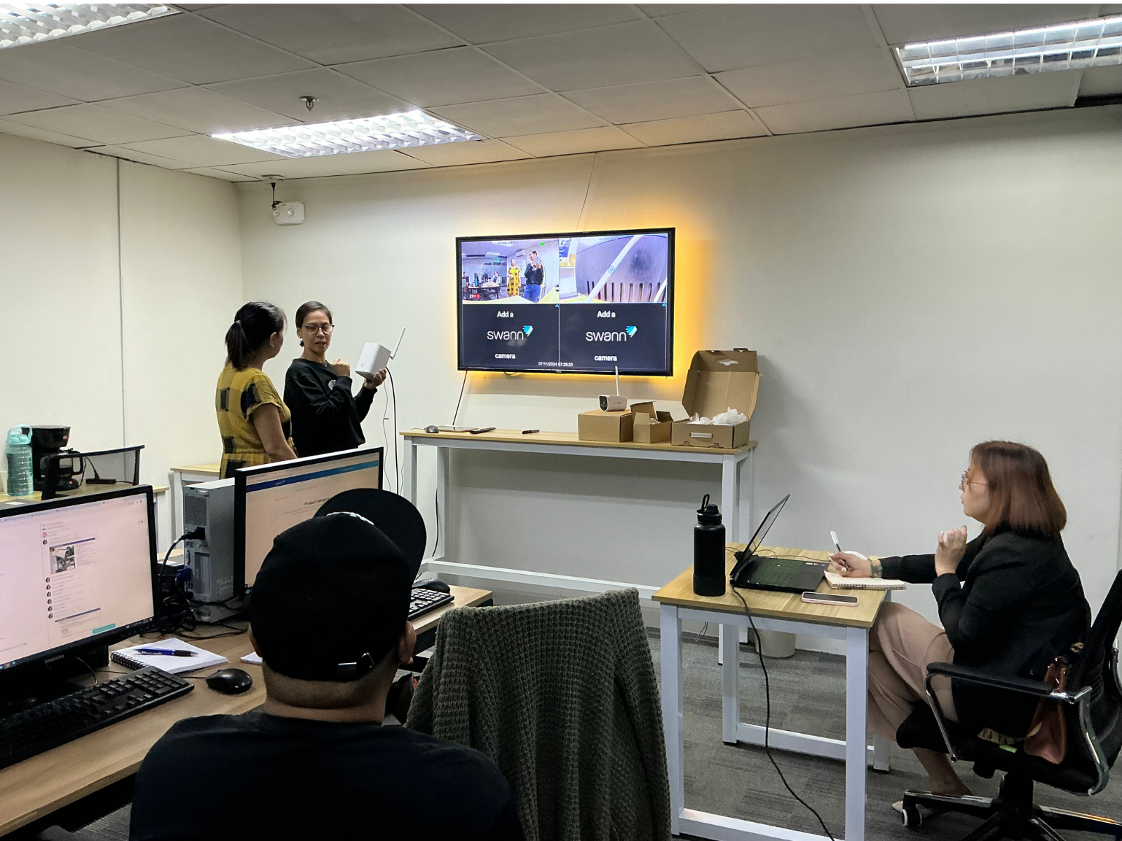A colleague leading a product training session