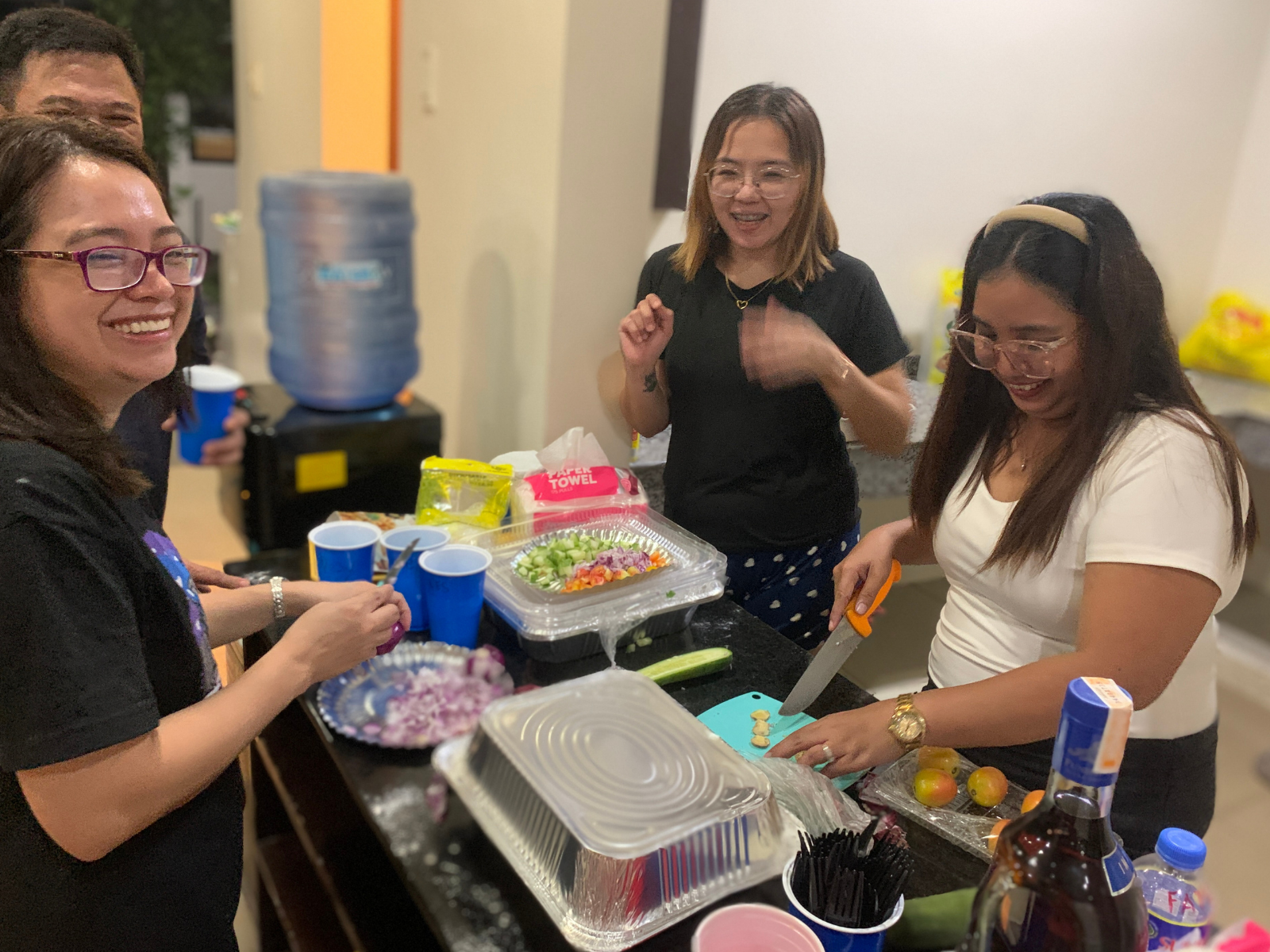 Colleagues preparing a shared meal